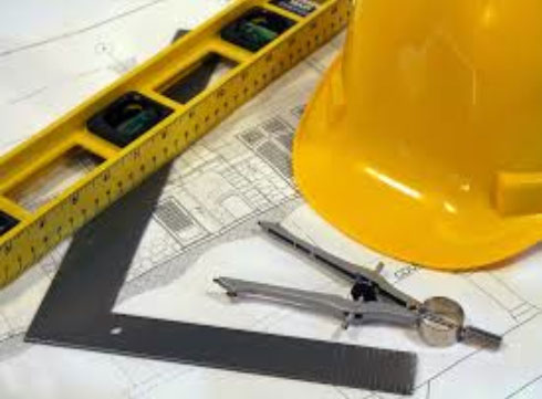 Image of roofing tradesman tools & building plan